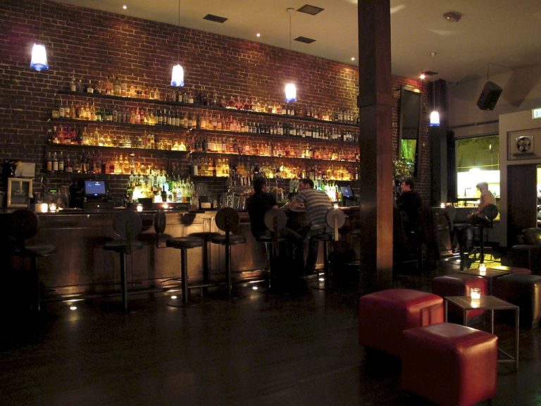 Two men have a drink at Swig bar in San Francisco